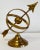 Vintage brass armillary sundial sphere atop a tiered brass base. Classic office, bookshelf, desktop or coffee table decor...