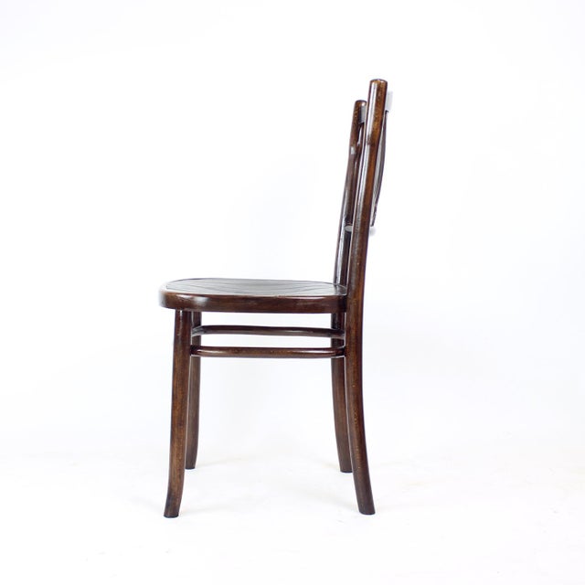 Wooden chair produced in Czechoslovakia in the 1950s. The original label is no longer present, but the chair was produced...