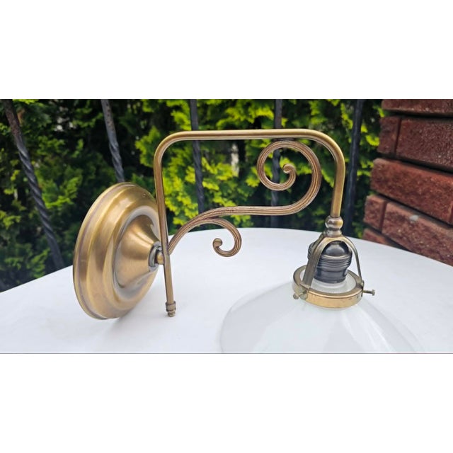 Art Deco Brass Wall Lamp, dimensions: height 20.5 cm, depth 33 cm, lampshade diameter 20 cm, dimensions of the sign to the...