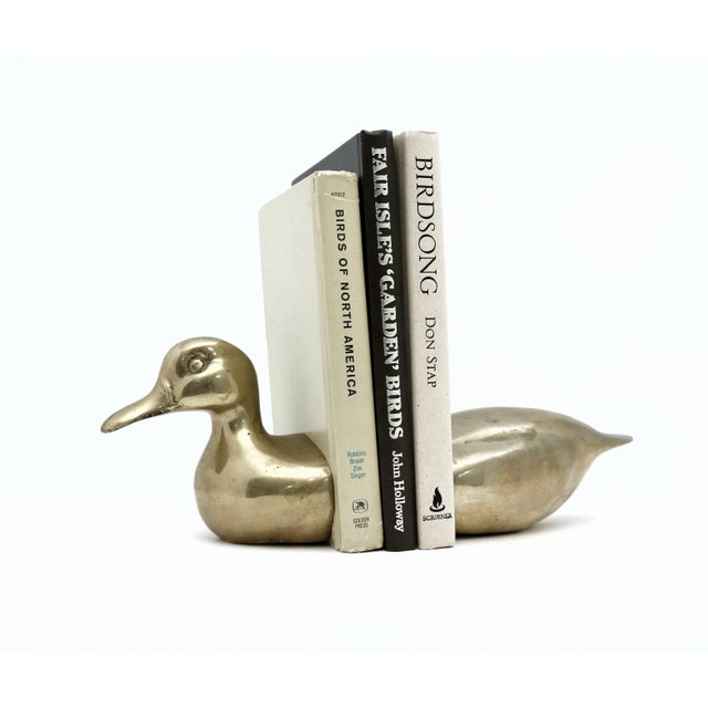 Vintage brass duck bookends- set of 2 This listing is for a set of fabulous brass bookends; duck head & body! Place this...