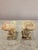 A striking pair of vintage carved stone stone candle holders featuring beautiful natural veining in warm cream, honey,...