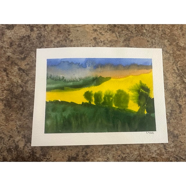 Luminous golden yellow fills the landscape in this expressive original watercolor by Michigan artist Chani MacKay. Layers...
