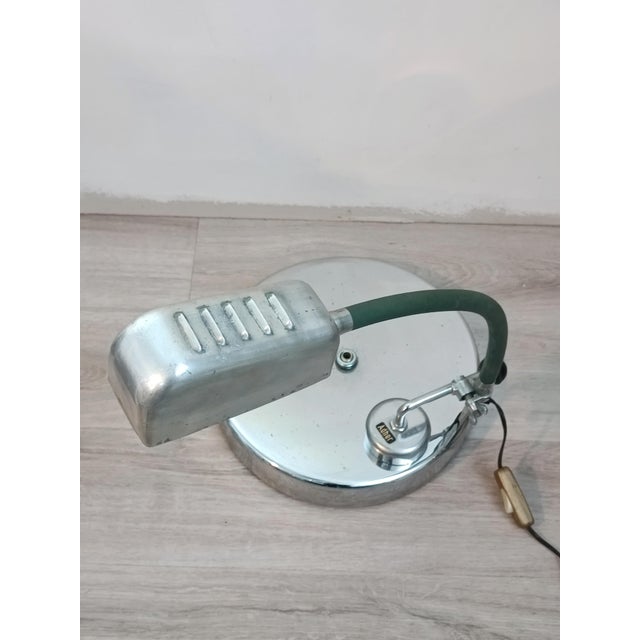 Beautiful industrial lamp, workshop/desk lamp by Adher. France, 1950s. Metal structure covered in ribbed green plastic....