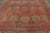 This antique 10x15 Turkish Anatolian rug, hand-knotted in wool circa 1900-1909, features a striking all-over lattice of...