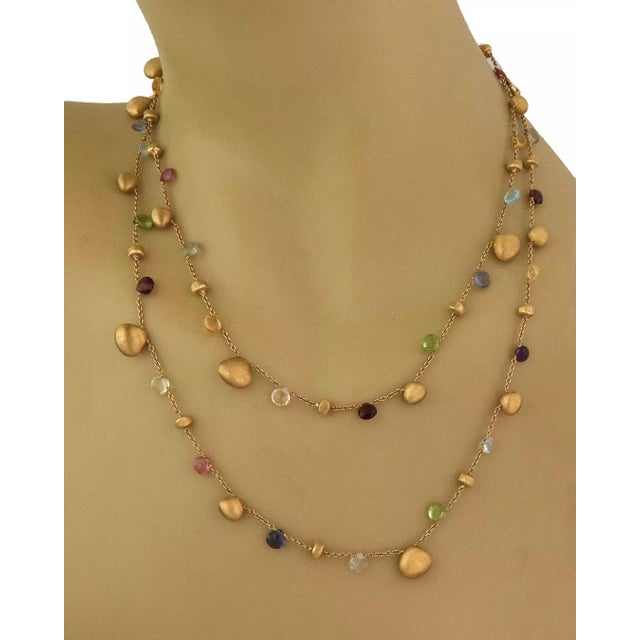 This is an authentic beaded necklace by Marco Bicego from the Paradise Collection. It is crafted from 18k yellow gold...