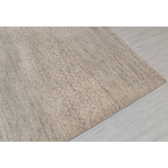 Featuring a super soft wool surface, the rug is easy to wash and maintain. Every inch of this rug is made by hand.
