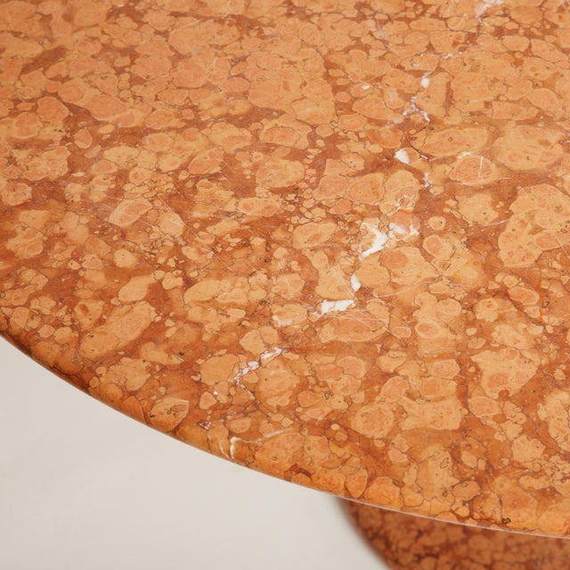 Italian Marble Pedestal Dining / Center Table Striking round pedestal table featuring a richly patterned marble top in...