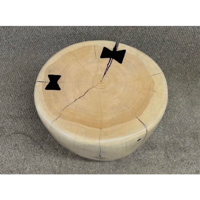This table (or stool) is carved from reclaimed Ivory Cedar Wood, together with Ebony Bow-Tie Joints by California artist...