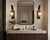 A striking pair of "Mateo" wall sconces designed and manufactured in the United States by Marian Jamieson. These...