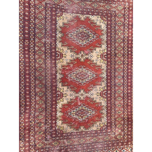 Beautiful vintage Pakistani rug with nice geometrical design in style of Turkmen rugs and nice colours, entirely hand...