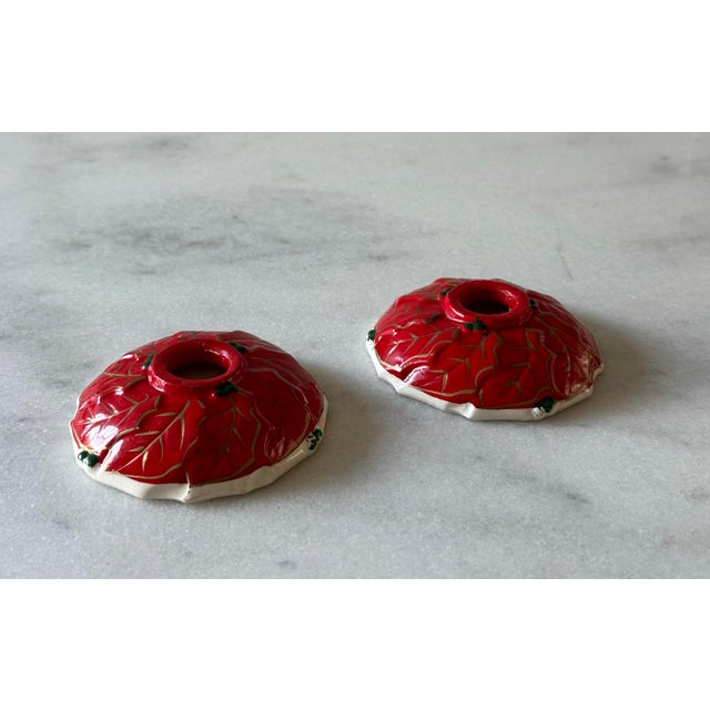 Pair of vintage ceramic holiday wreath candleholders in the style of Hold Howard. Made in Japan. Candle opening measures...
