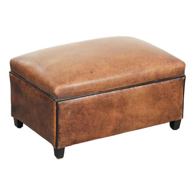Sheepskin Ottoman with Black Piping For Sale