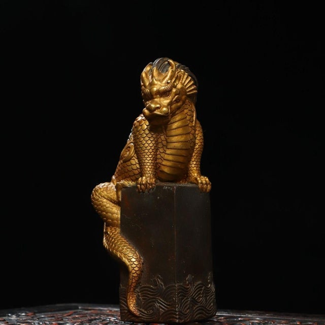 This is a finely crafted antique gilt bronze sculpture of a mythical beast, often associated with water-absorbing...
