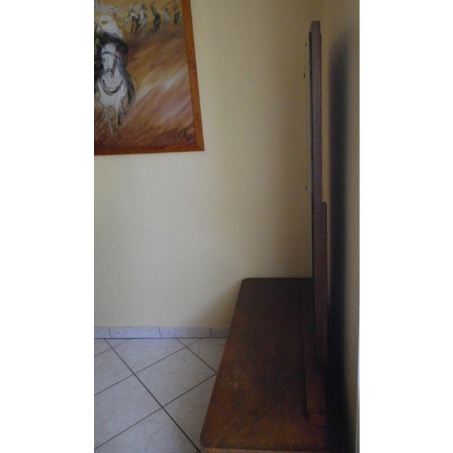 Art Deco dressing table, boat-shaped, made of wood (probably oak) and veneer, circa 1940. This dressing table rests on...