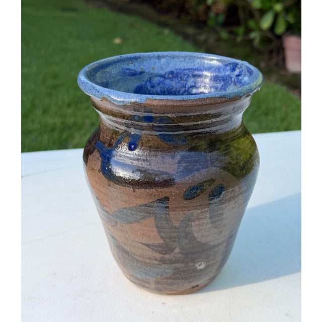 Hand-thrown vintage studio pottery vase with a strong, rounded form and a richly layered glaze in deep cobalt blue,...