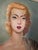Original 1953 oil on canvas portrait signed KUBRA lower right. A mid-century glamour portrait of a blonde woman with...