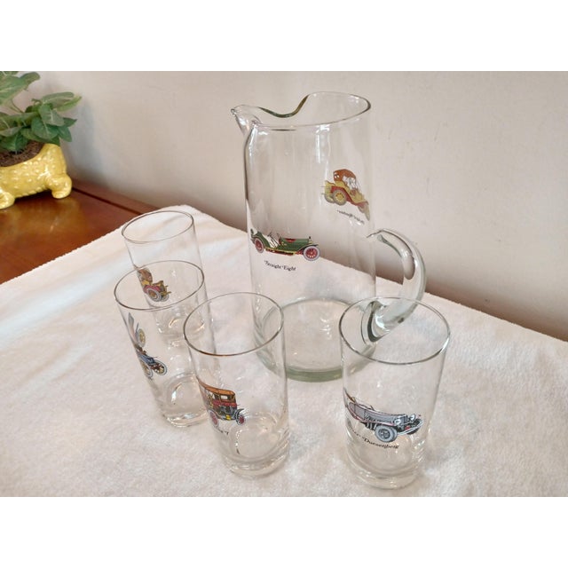 Vintage Antique Cars Pitcher and Highball Glasses 5 Pc. Set. Set is in like new condition. Graphics are still bright and...