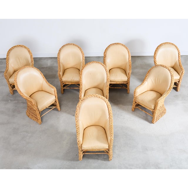 A substantial suite of eight gorgeous rattan and wicker armchairs from the estate of late California Senator Dianne...