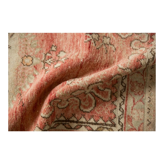 :: Large center medallion with central floral bouquets atop an abrashed field with inwardly directed cloud band stylized...