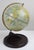 Vintage 1949 6" metal desktop world globe by Chad Valley, England. Shows ship routes with miles between England and the...