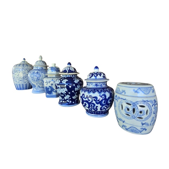 Offered as a stunning set of five, these traditional blue and white lidded ginger jars bring timeless elegance and classic...