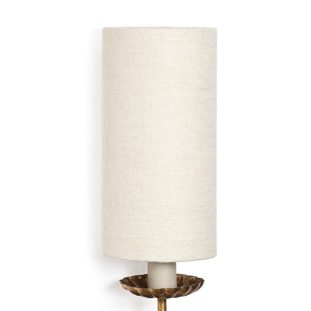 With a striking silhouette and sophisticated sense of style, our Louis Sconce evokes 19th-century Paris. This antique-...