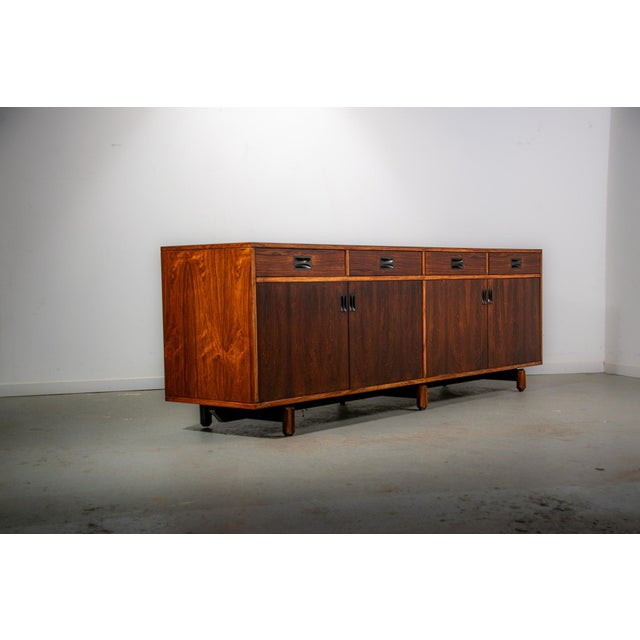 Made in the 1960s this Stildomus sideboard oozes understated class with a simple overall desig the choice of high quality...
