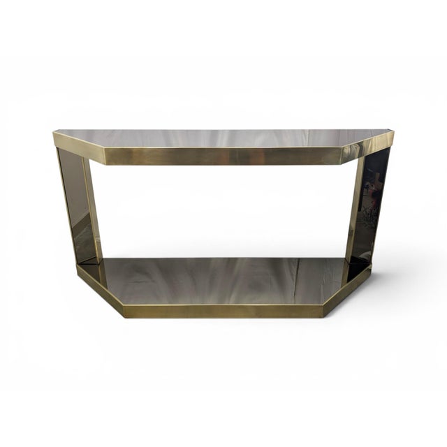 This elegant console table features a postmodern-inspired geometric design, typical of high-quality Italian production...