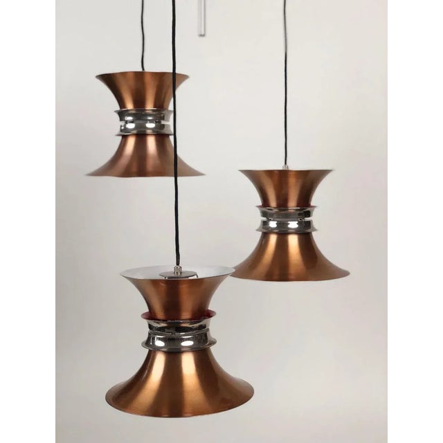 A rare three element pendant lamp designed by Carl Thore for Granhaga Metallindustri. This example is part of the Trava...
