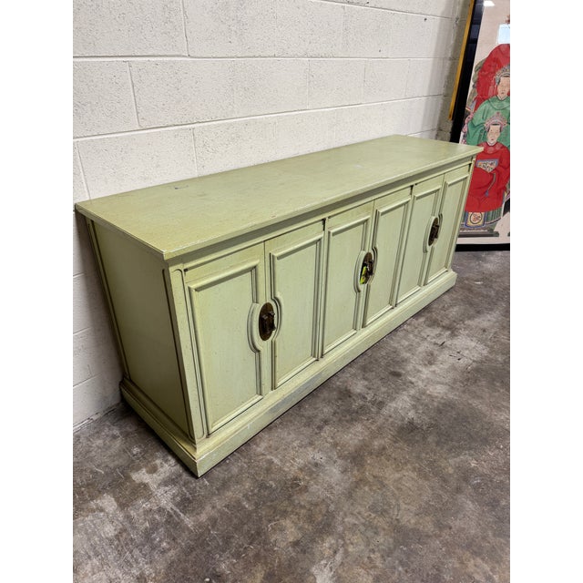 Love this color! Green with bird egg blue undertones. Flecked speckled black all over. Brass pulls. Solid wood. See photos...