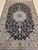 "This exceptionally fine handwoven Persian Nain rug, signed by the renowned Habibian workshop, was crafted in the 4th...