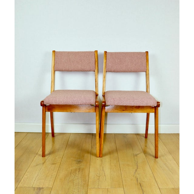 Set of 6 vintage chairs in pink fuchsia boucle fabric. Completely restored original chairs from the 1970s - set of 6. New...