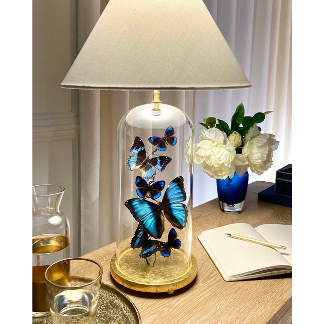 This is a one of a kind, hand made cloche lamp with real butterflies inside. The base is made of wood, gold leafed with...
