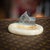 A charming 20th century silver ashtray, combining natural onyx with a sporting theme closely associated with british...