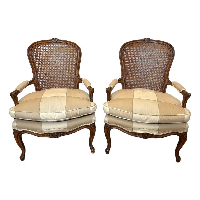 Mid 20th Century Classic French Bergère Chairs With Cane Backs - A Pair For Sale
