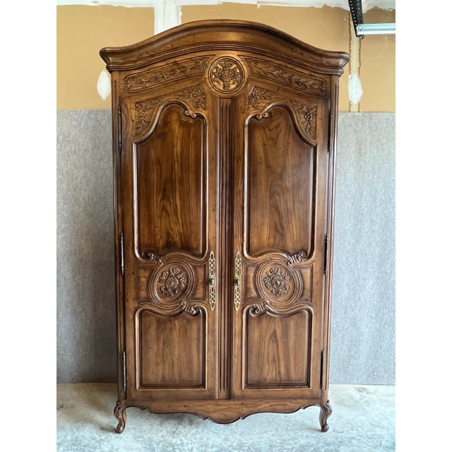 Vintage Late 20th Century Henredon French Provincial walnut? storage armoire or wardrobe from the Four Centuries...