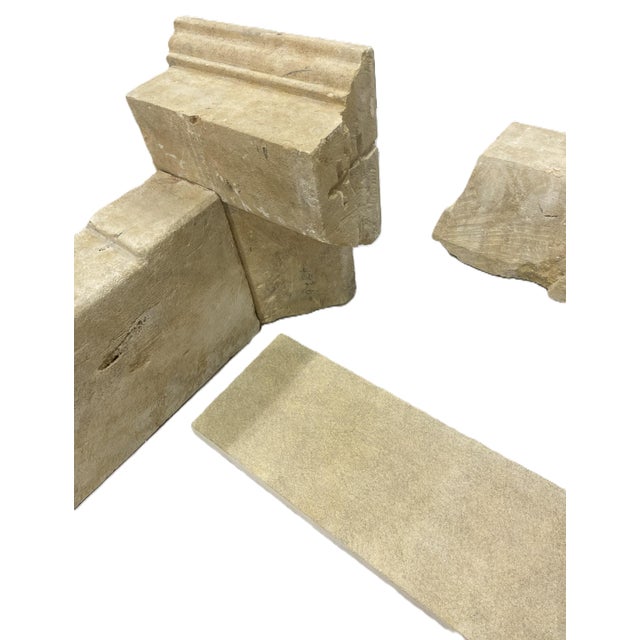 Beautiful original French mantel carved from Savonnières limestone. This mantel comes with a custom matching hearth. An...