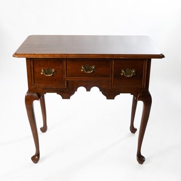 Stickley table with three dovetailed drawers. Quality craftsmanship and very sturdy.