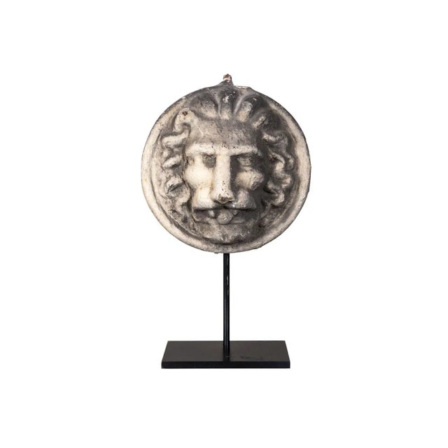 Renaissance Revival lions' mask. Hand-carved stone mounted on new blackened steel stand.