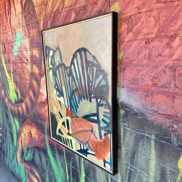 This is a framed abstract painting by Cleveland, Ohio artist Rolf P. Velmin from the Mid 20th Century. It features hues of...