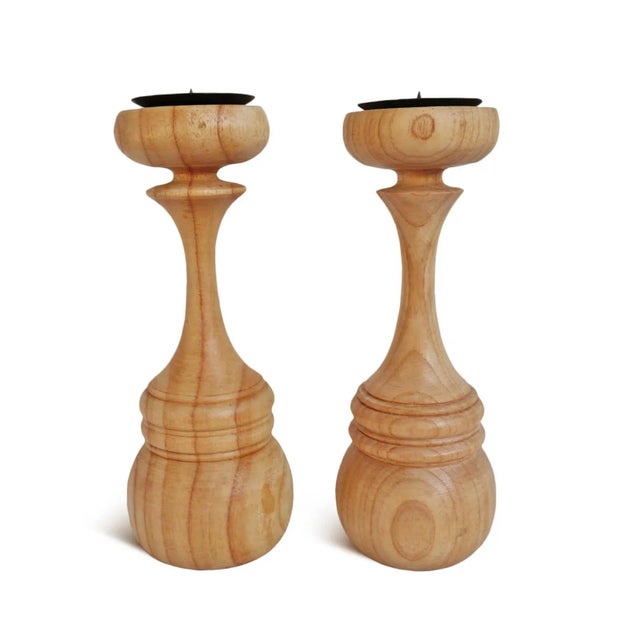 Natural sanded hand turned candle stands with black iron nail dish. Holds 1.5" diameter candle. Each piece will slightly...