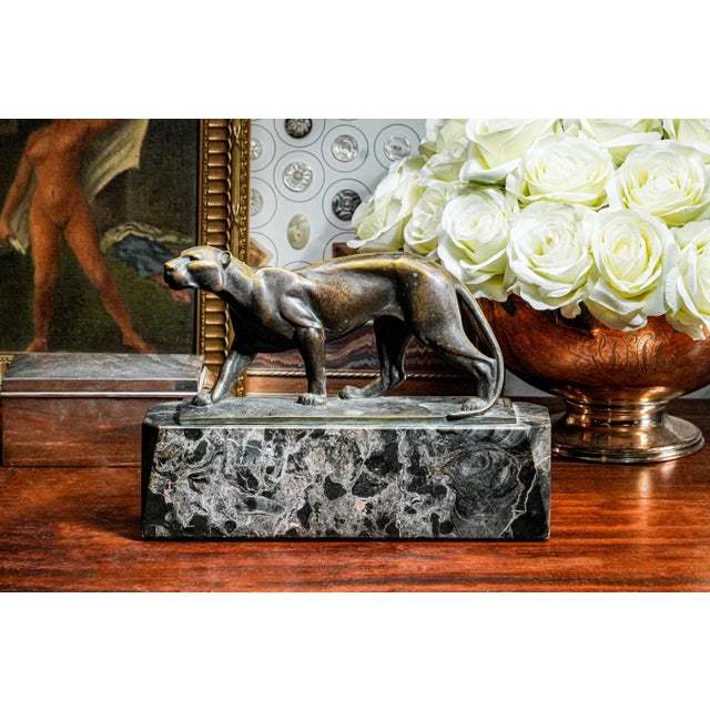Commanding and elegant, this Art Deco bronze panther sculpture is a superb expression of early 20th-century European...