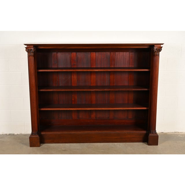 A beautiful antique American Empire or Renaissance Revival bookcase In the manner of R.J. Horner & Co. USA, Circa 1920s...