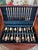 An elegant vintage 64-piece flatware set in the Golden Corsica pattern by Wallace, crafted in quality 18/10 stainless...
