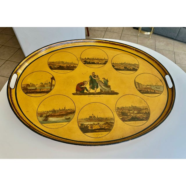 Large early 19th-century French Empire Directoire period camomile yellow oval tole tray. Decorated with neoclassic images,...