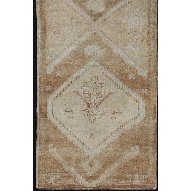 Tribal Vintage Turkish Oushak Runner Neutral and Warm Colors With Tribal Medallions For Sale - Image 3 of 13