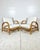 Vintage pair of rattan lounge chairs. Bent rattan deco horse shoe style. Smaller scale chairs that are still perfect for...