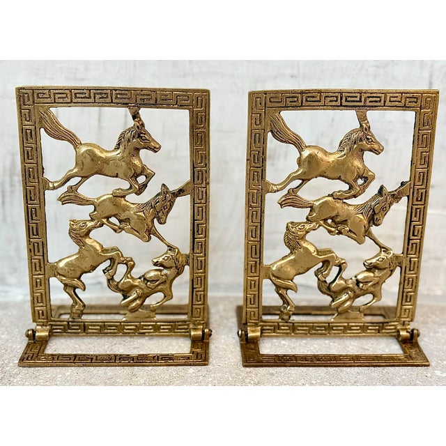 Vintage Chinoiserie Brass Horse Bookends With a Cut-Out Design of Galloping Horses Surrounded by a Greek Key Border-a Pair For Sale - Image 11 of 12