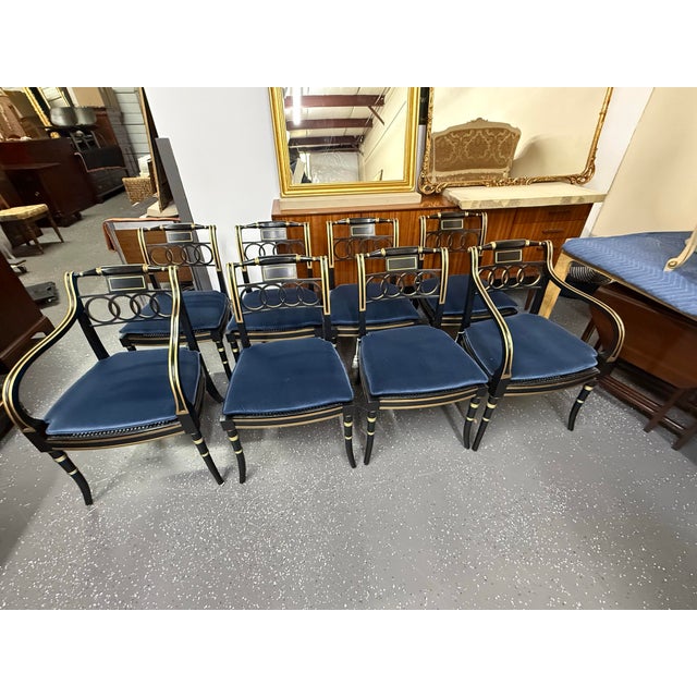 Late 20th century, the "Colonel Alston" dining chairs from the Historic Charleston collection by Baker Furniture. Ebonized...