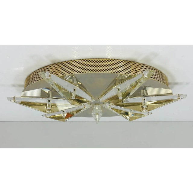 Large ceiling or Wall light designed and manufactured in Italy. The piece is very stunning, the faceted crystal pieces...